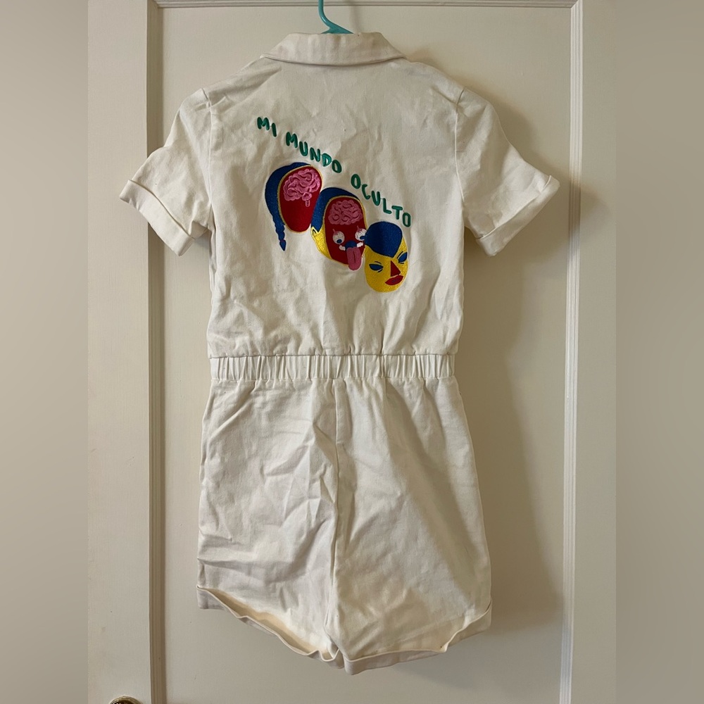 RARE A fashion brand company white jumpsuit romper with embroidered back